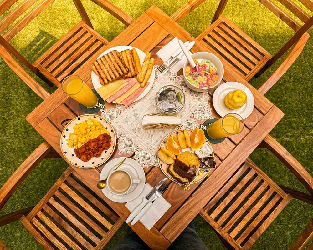Table prepared in the dining area of Los Olivos Hotel