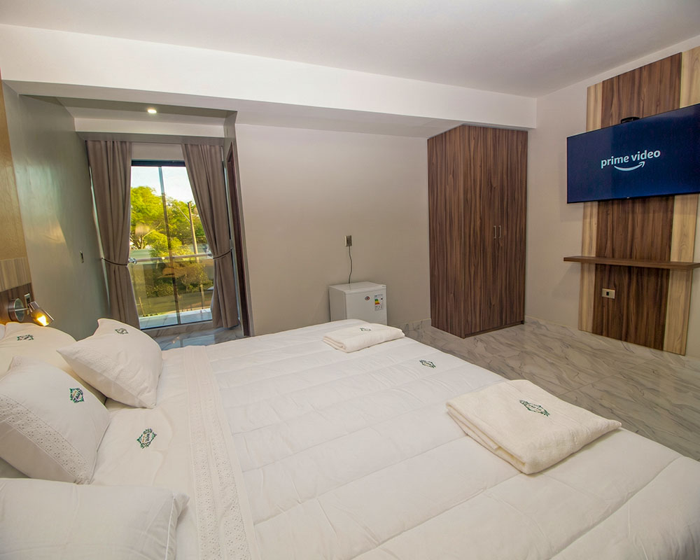 Room at Los Olivos Hotel prepared for rest