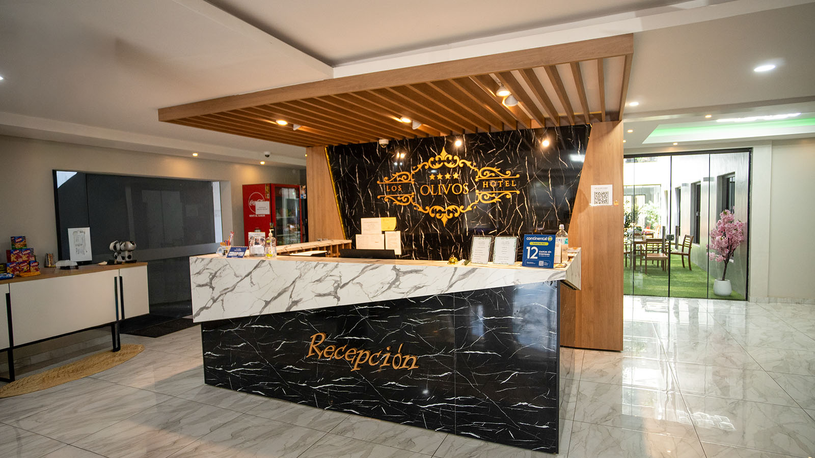 Reception area at Los Olivos Hotel